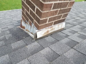 Spring Roof Inspections Damaged Chimney Flashing